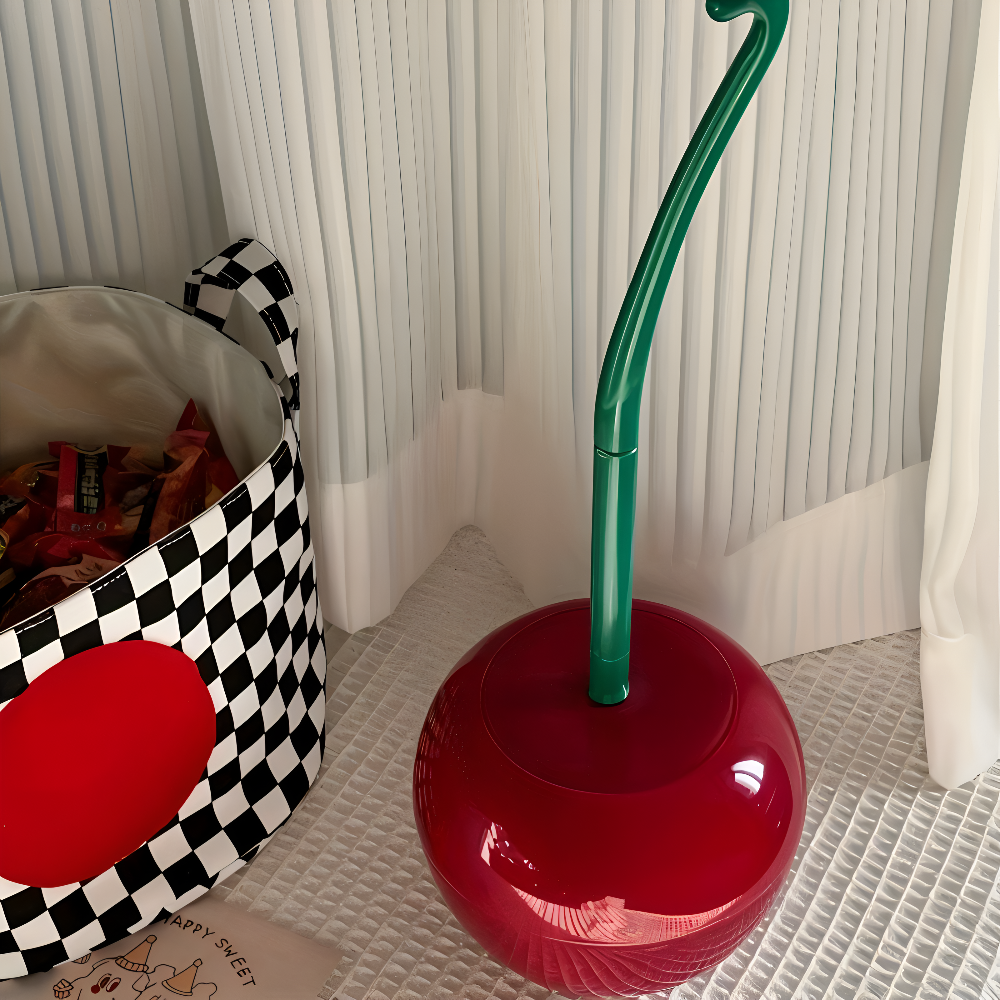 Designad toalettborste med elegant hållare för badrummet. Funktionell och stilren detalj som höjer hemmets hygien.