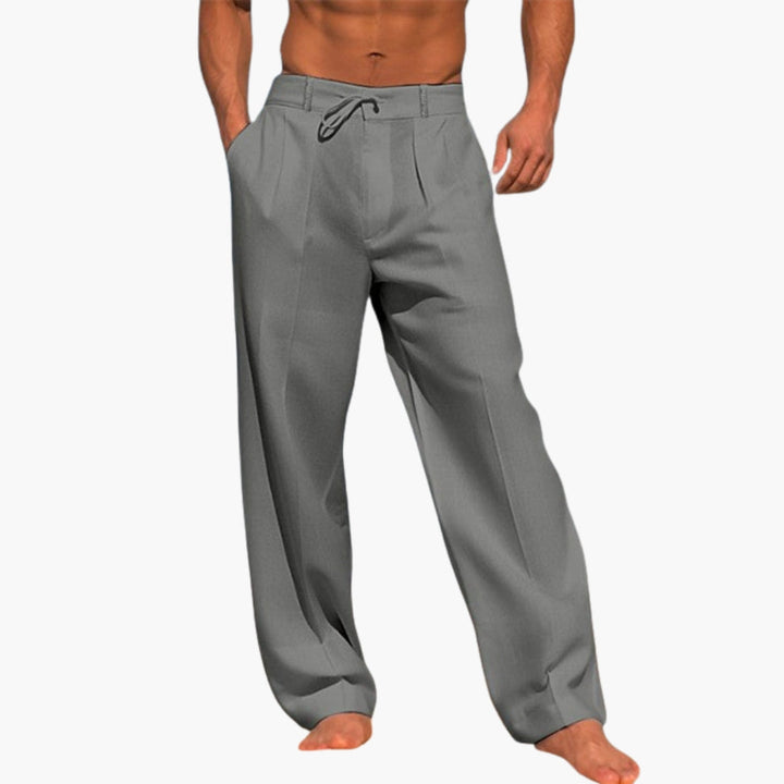 Stilrena herrbyxor med vid ben och elastisk midja, perfekta för maximal komfort och casual fritid.