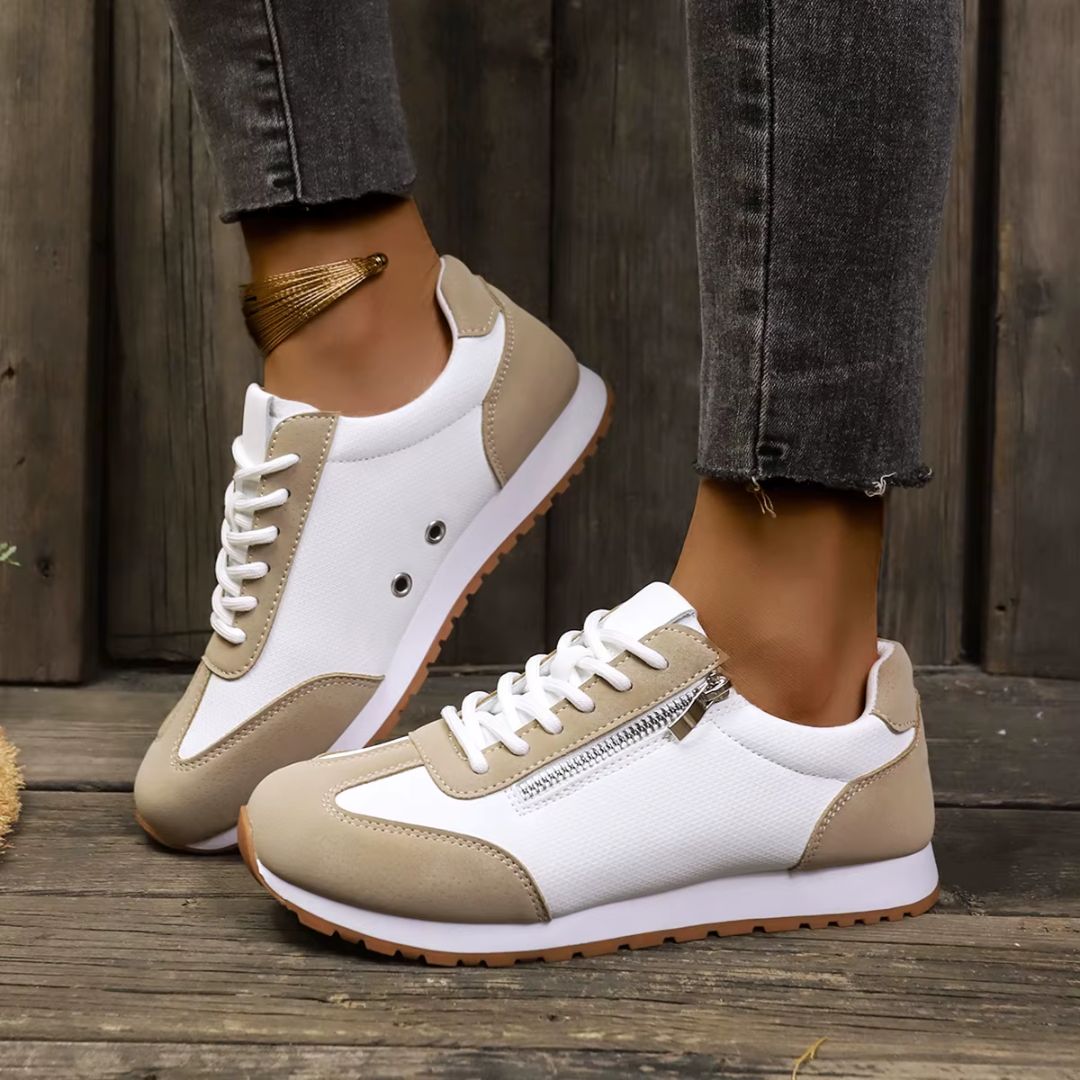Modern dam sneaker i grå nyans, lätta och stilrena fritidsskor som erbjuder komfort hela dagen.