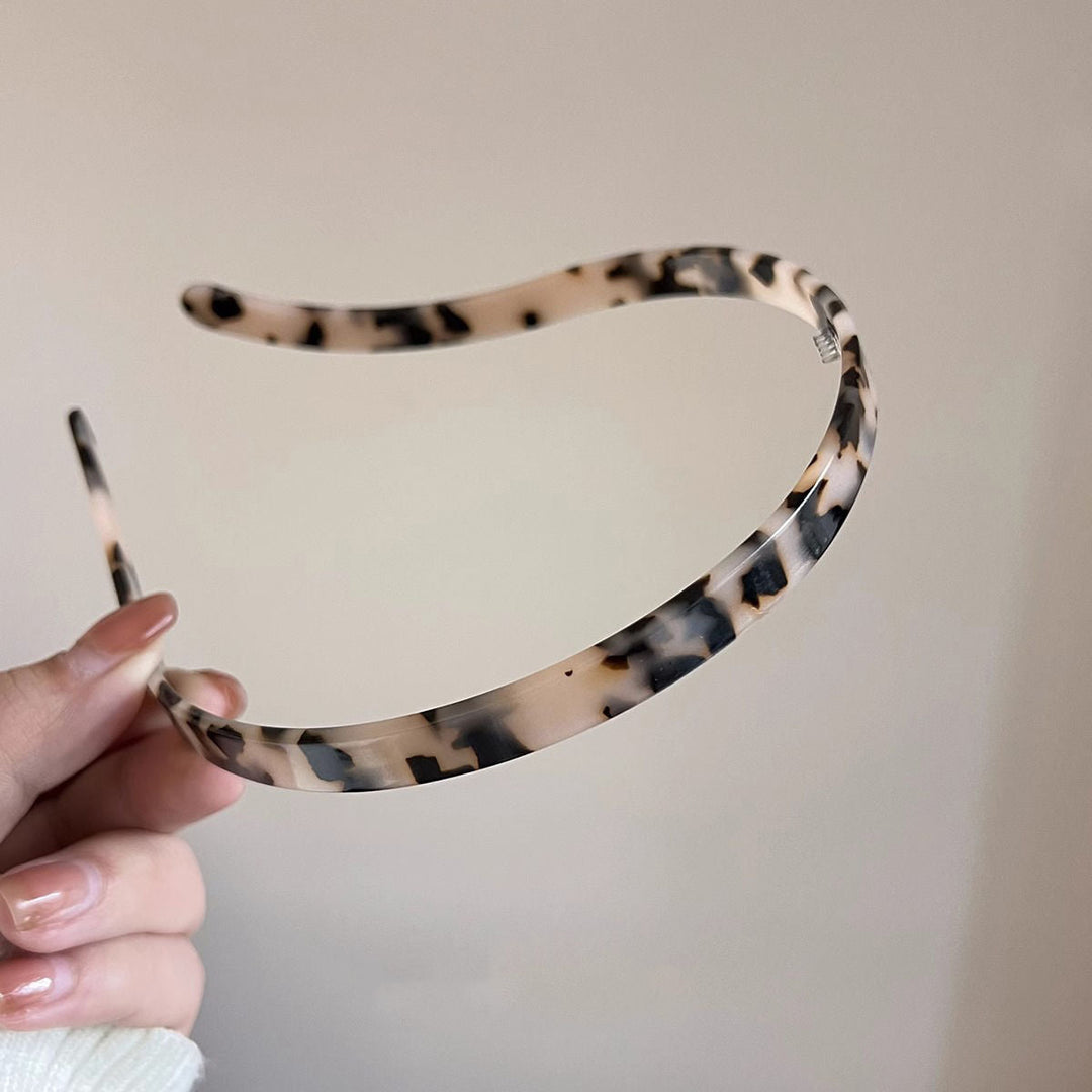"Stilrent unisex acetatpannband för glasögon, böjt design, perfekt för dag och natt. Accessoar för kvinnor, bekvämt, elegant.