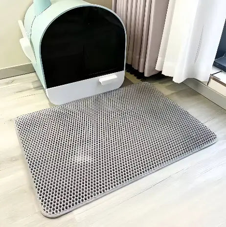 Grå stor kattlådematta i EVA-skum framför modern täckt kattlåda