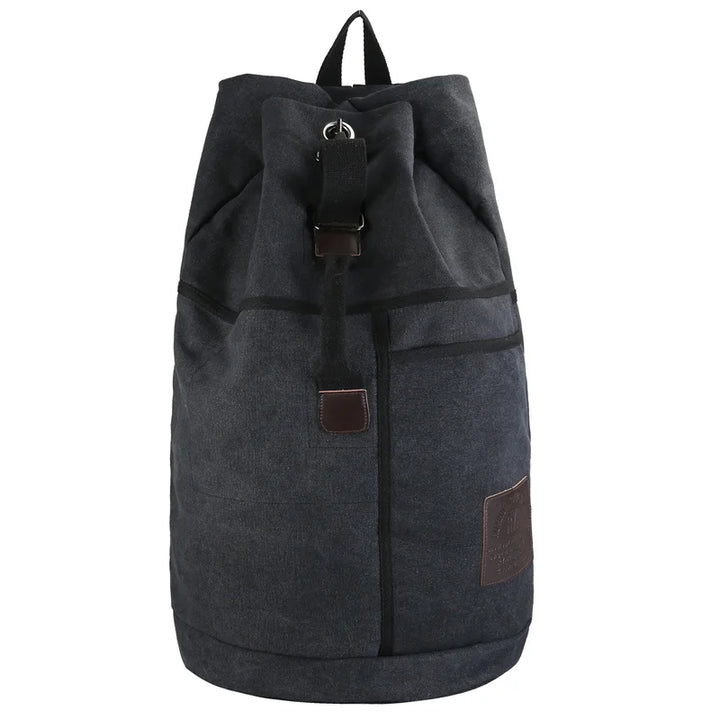 Unisex storvolymsryggsäck i canvas, redo för äventyr & vardag. Idealisk för vandrare & resenärer.