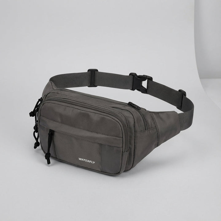 Rymlig fritidsväska för midjan. Slitstark nylon organiserare med flera fack, passar alla kön.