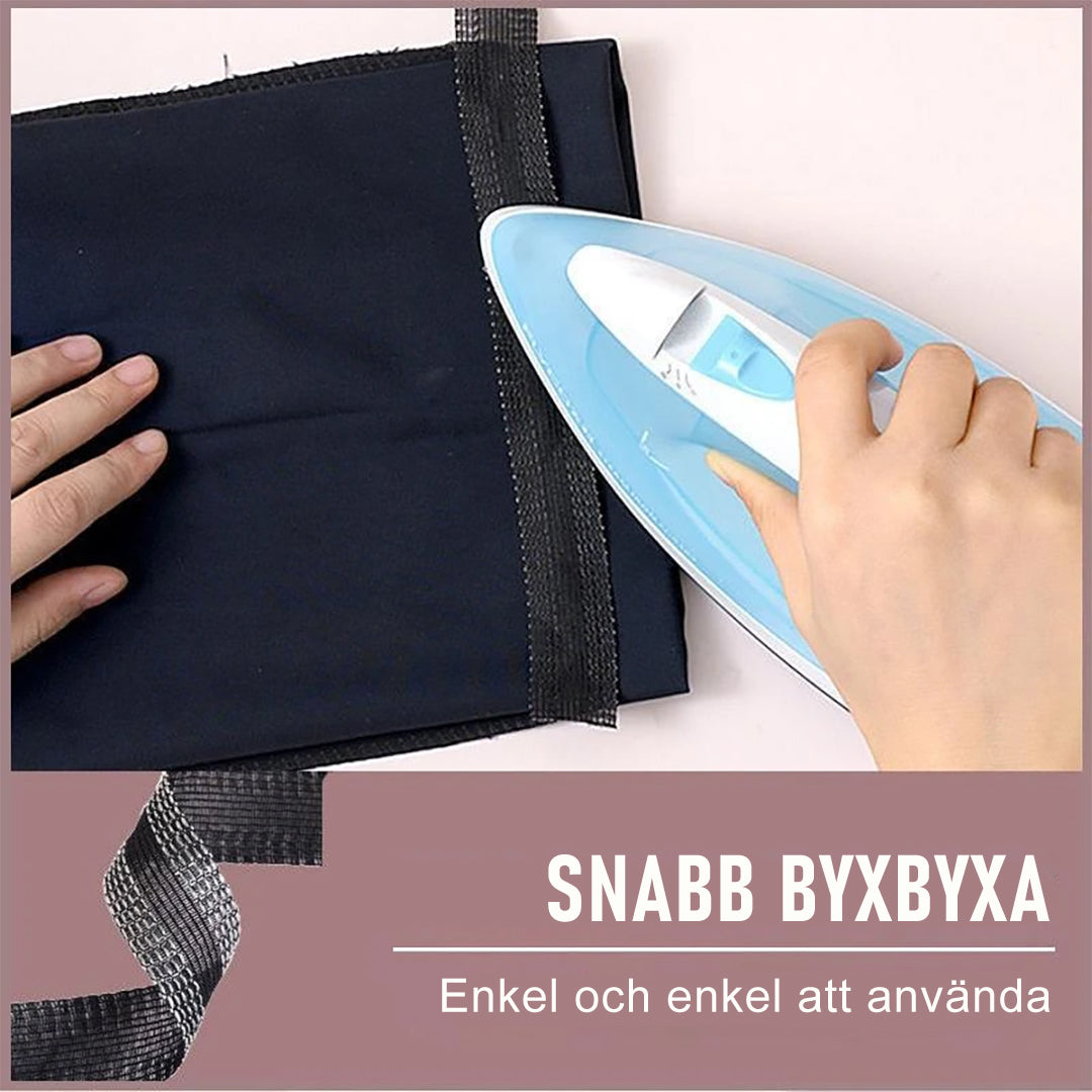"Strykbart fållband för byxor och kläder, vit textur, håller fållen snygg och professionell, enkel lösning utan sömnad."