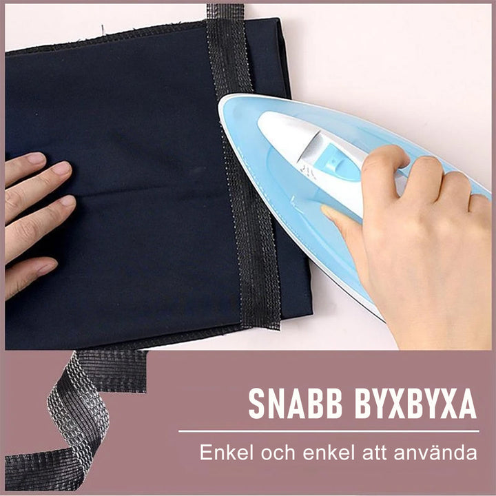 "Strykbart fållband för byxor och kläder, vit textur, håller fållen snygg och professionell, enkel lösning utan sömnad."
