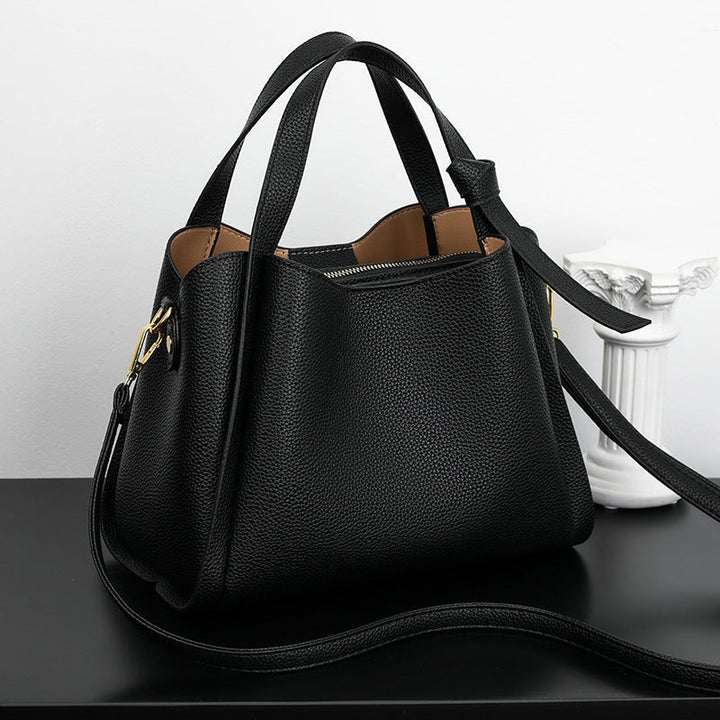 Stilren crossbody väska för dam visad i flera färgval