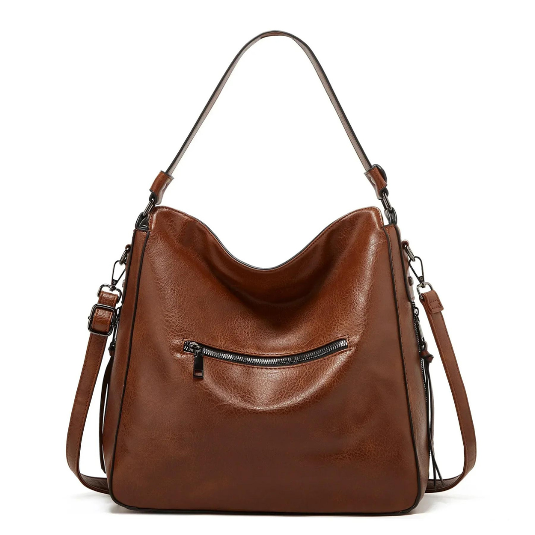 Svart crossbody väska i läderlook med justerbar rem för dam