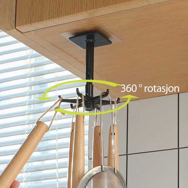 Svart 360° roterande fällbar krok, väggmonterad för multifunktionell användning i kök och hem.