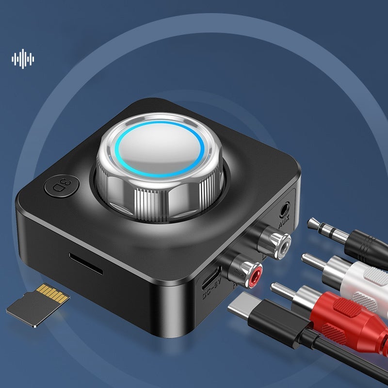 "Svart Bluetooth 5.0 RCA mottagare med AUX, kompakt design och tydliga volymkontroller samt microSD-kortläsare"