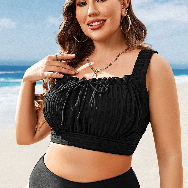 Svart volang bikinitopp för dam. Bekväma och stilrena badkläder för sommarens stranddagar.