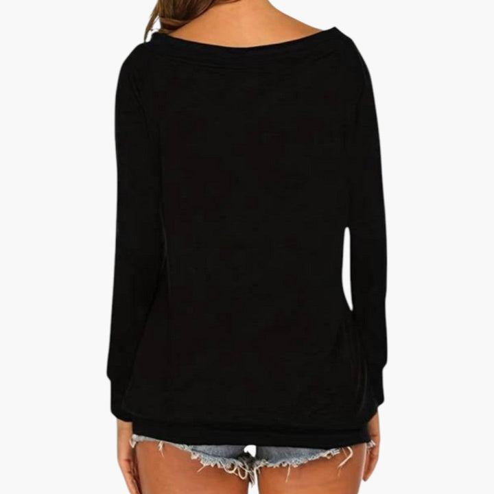 Rosa festtopp off-shoulder, långärmad. En elegant och stilren damtopp för kvinnor.