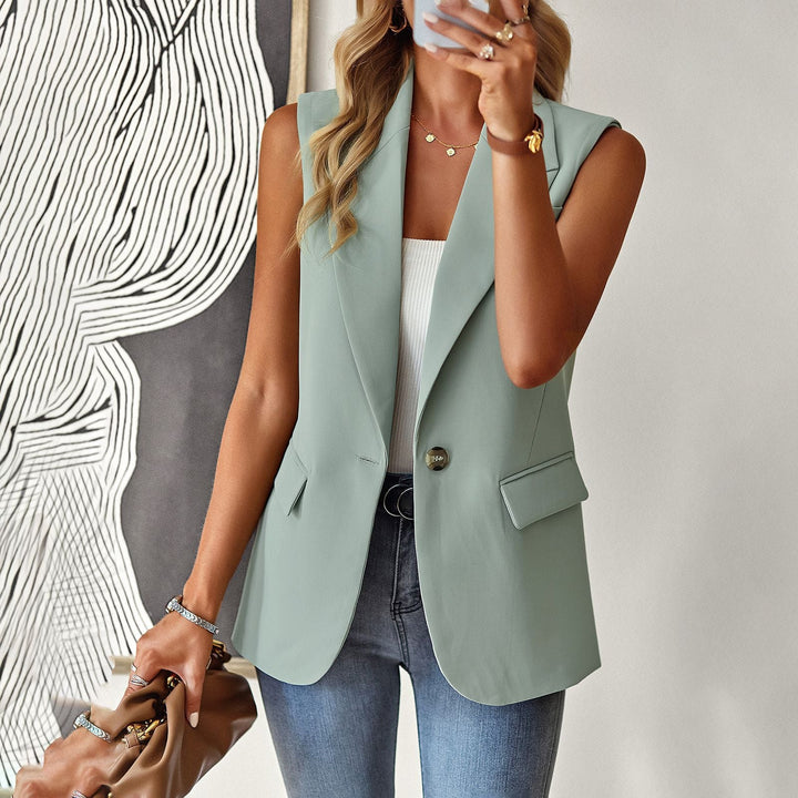 Svart elegant ärmlös blazer-topp för dam. Figurnära stil, perfekt för kontor, vardag eller fest.