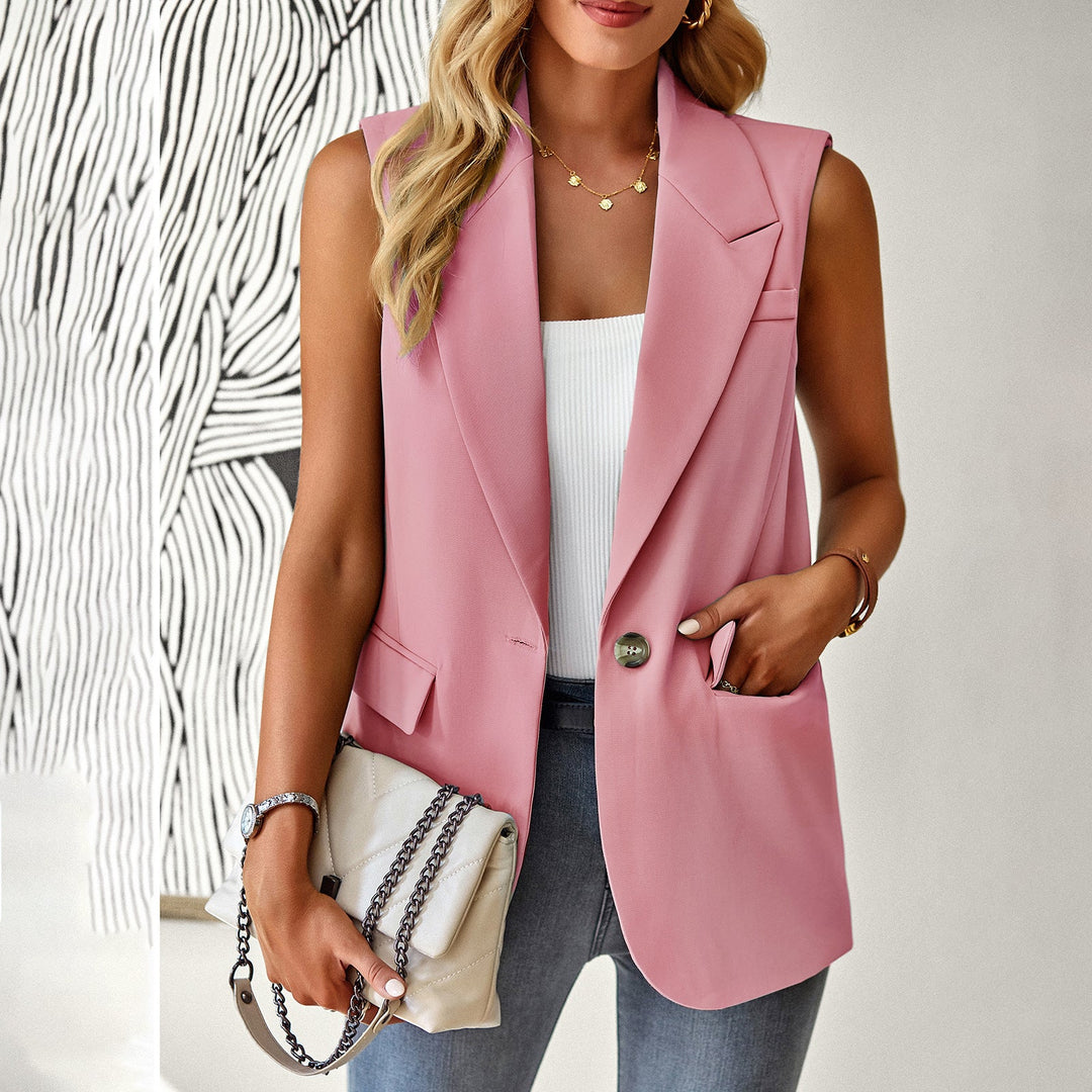Rosa ärmlös blazer-topp för dam. Modern figurnära design som passar både kontor och fest.