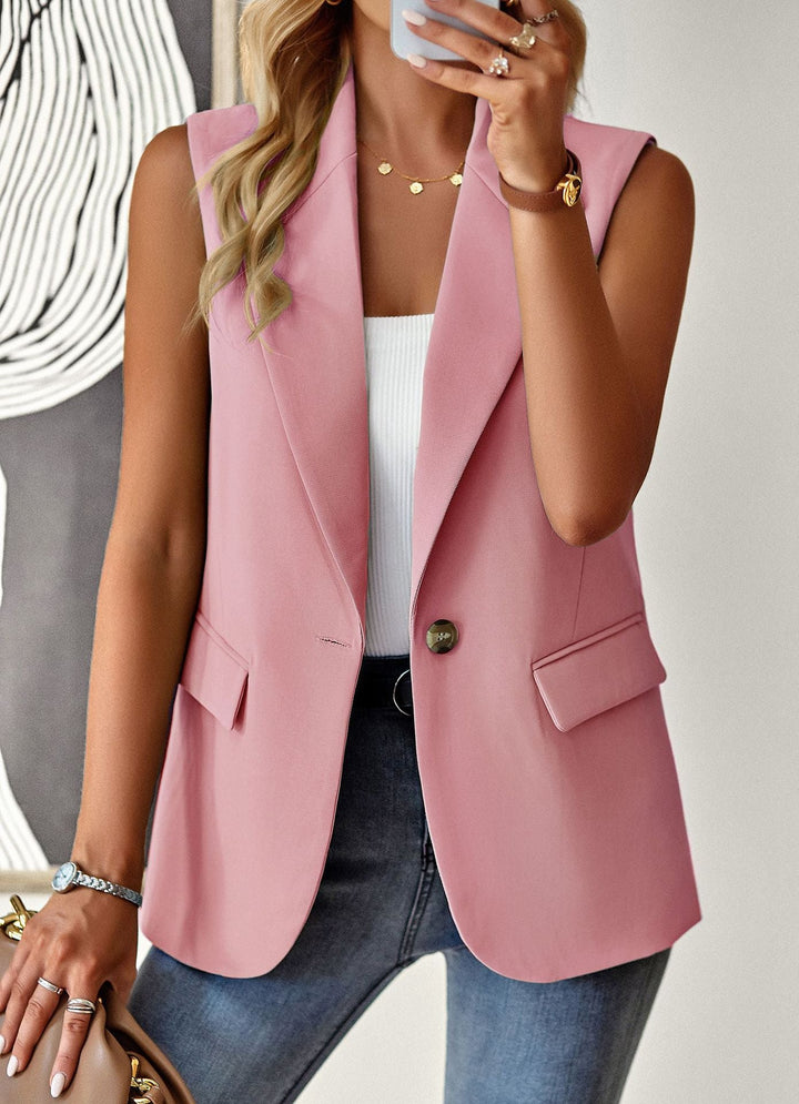 Figurnära ärmlös blazer-topp i dammode. Mångsidig elegant design för kontor, vardag och fest.