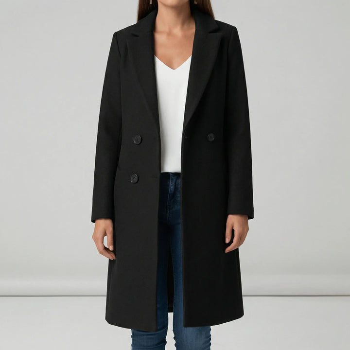 Kvinnors svarta figursydda kappa, lång modell. Elegant och tidlöst mode.