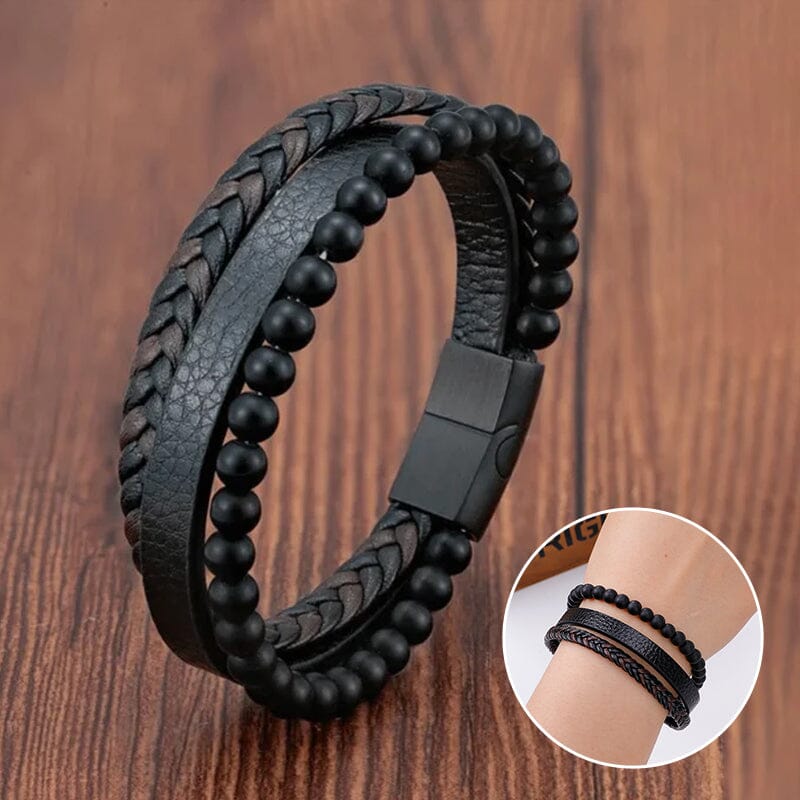 Svart flätat armband med hematitpärlor, stresslindrande och elegant accessoar för moderna män.