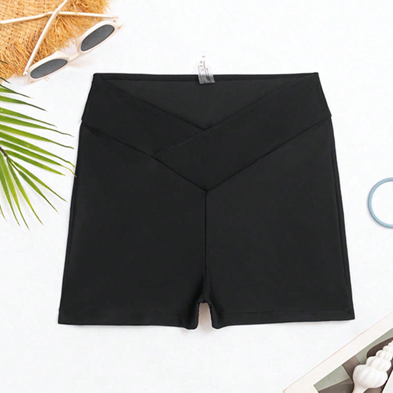 Bekväma högmidjade badeshorts i svart för dam. Idealiska simshorts för en aktiv dag vid stranden eller poolen.