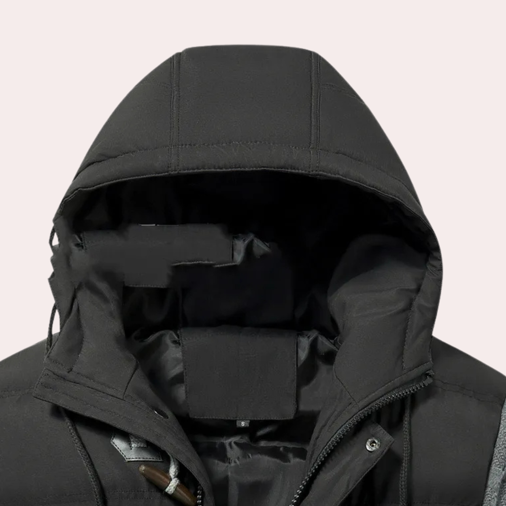 Stilren svart herrjacka, puffer vinterjacka. Perfekt ytterplagg för höst och kalla dagar, både varm och modern.