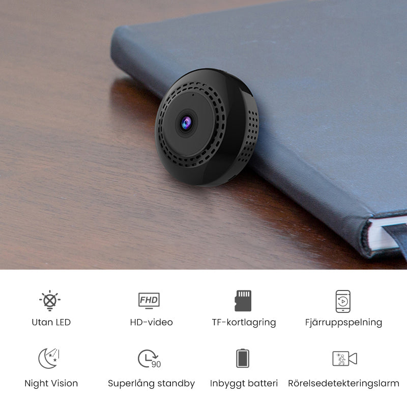 Svart mini WiFi-kamera för hem och bil, kompakt design, högupplöst video, mörkerseende, magnetisk bas för enkel placering.