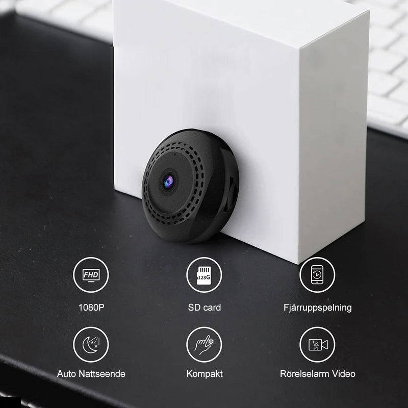 Svart mini WiFi-kamera för hem och bil, kompakt design, högupplöst video, mörkerseende, magnetisk bas för enkel placering.