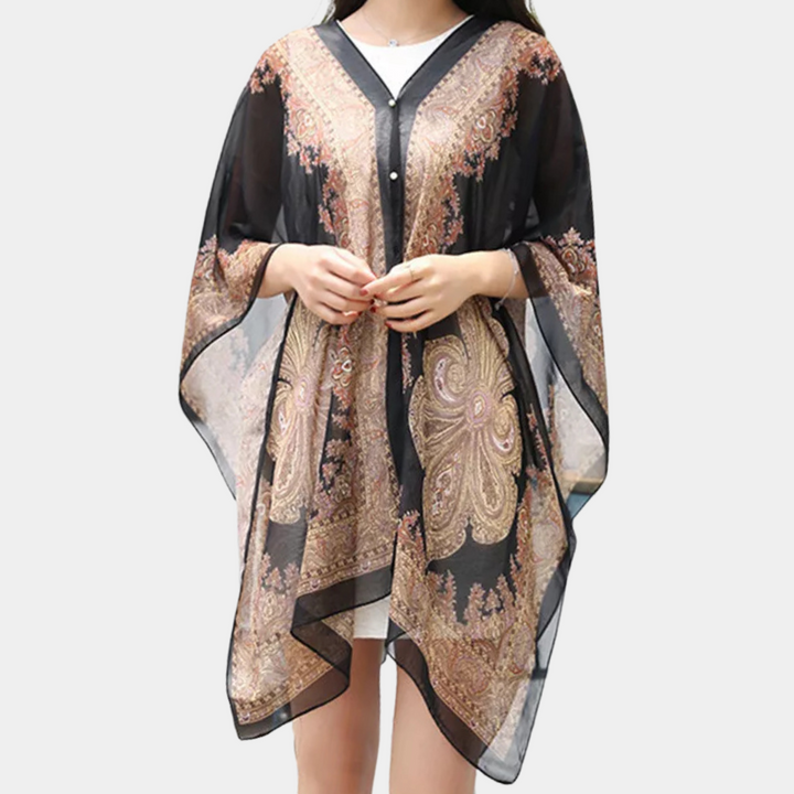 Svart Mira poncho-sjal för dam, elegant höstaccessoar, mångsidig one size. Perfekt för stilfulla lager.
