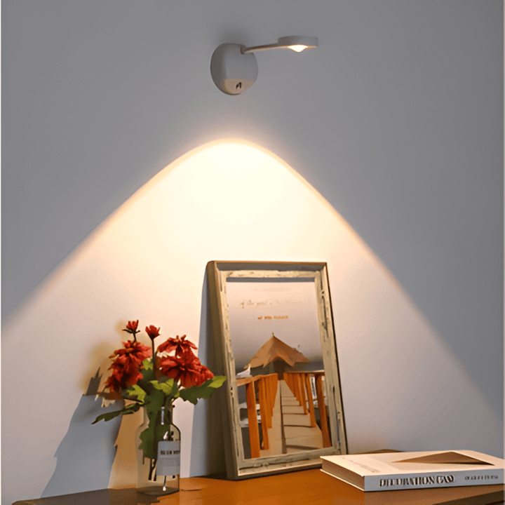Magnetisk montering av dimbar LED vägglampa i nordisk design. Snabb & enkel att flytta.