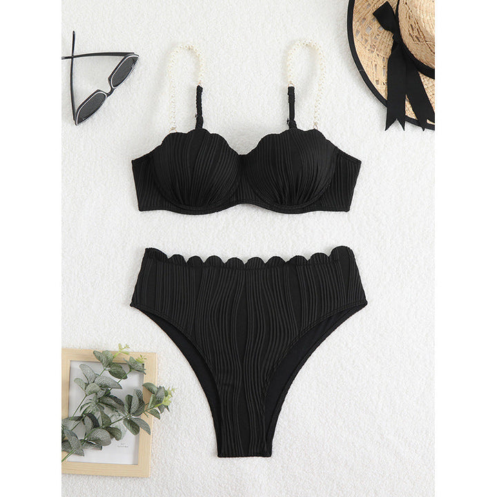 Svart ribbad push-up bikini för dam, perfekt för strand och pool. Trendiga badkläder för sommar.