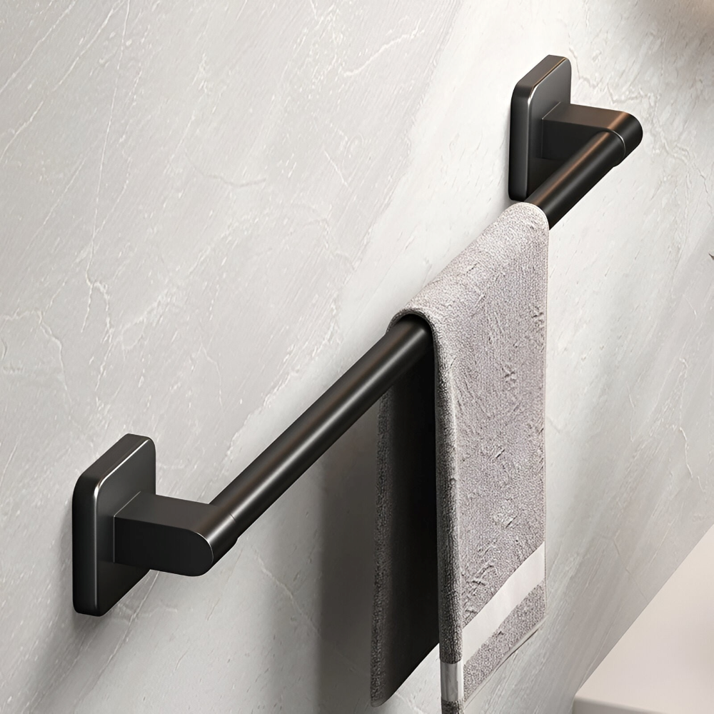 Självhäftande handdukshållare i svart aluminium. Enkel väggmontering i badrum.