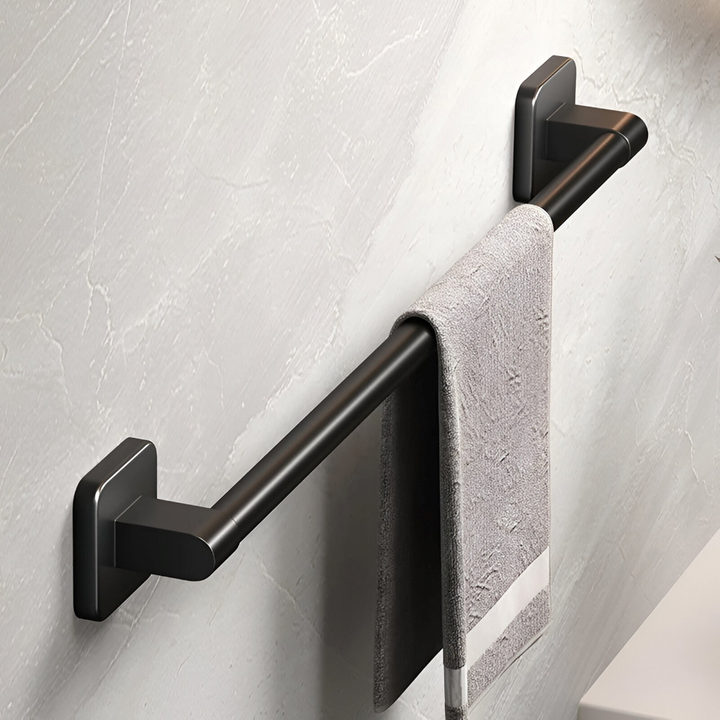 Självhäftande handdukshållare i svart aluminium. Enkel väggmontering i badrum.
