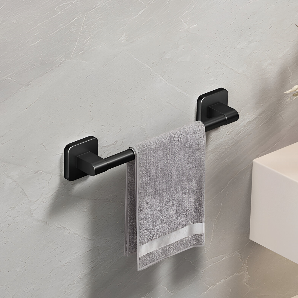 Väggmonterad handdukshållare i svart aluminium. Självhäftande badrumsförvaring.