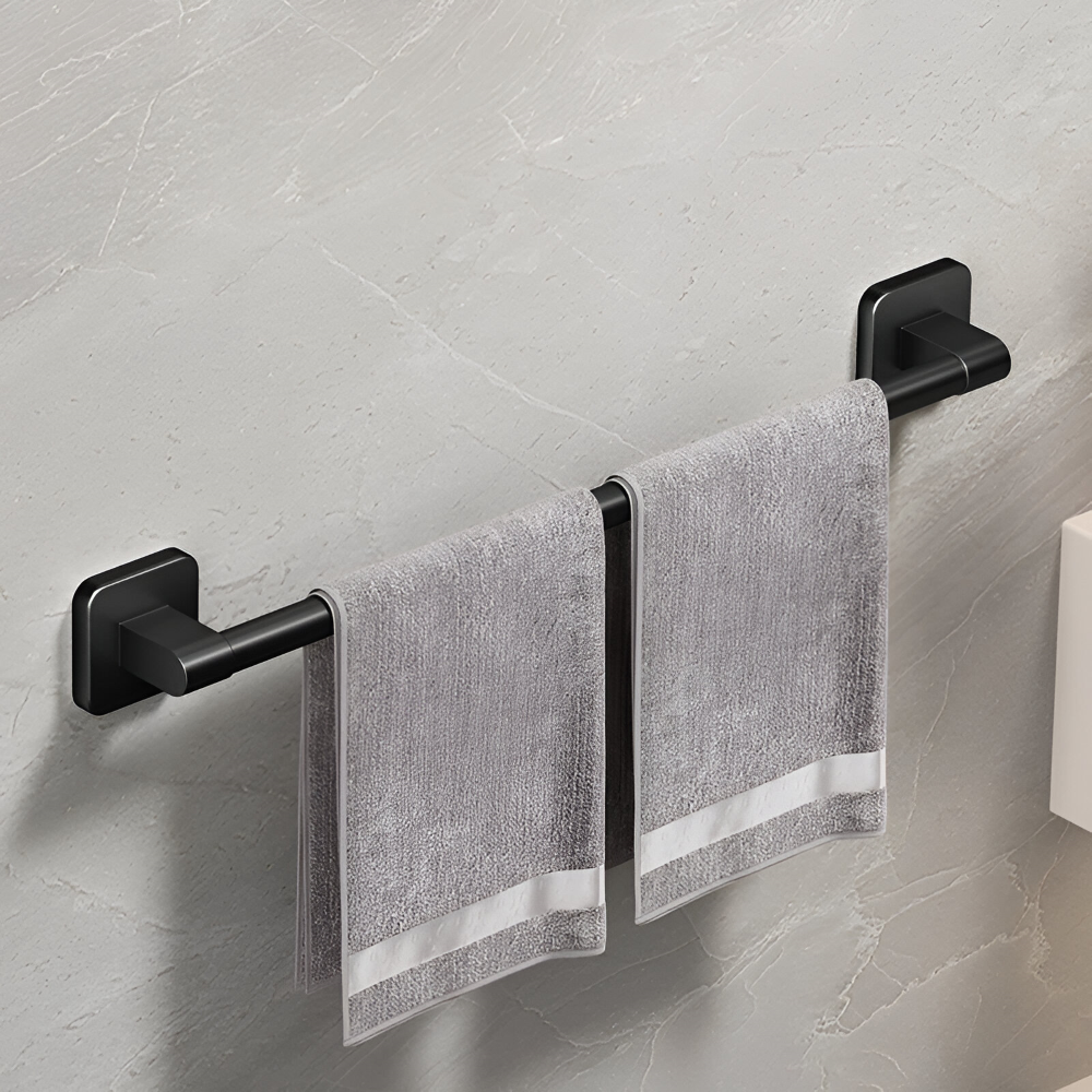 Badrumstillbehör: Självhäftande svart handdukshållare i aluminium. Modern design.
