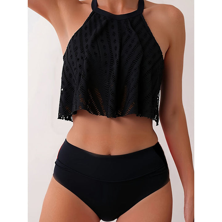 Dam crop-top bikini set i svart design. Högmidjade trosor & sportig topp för stranddagar.