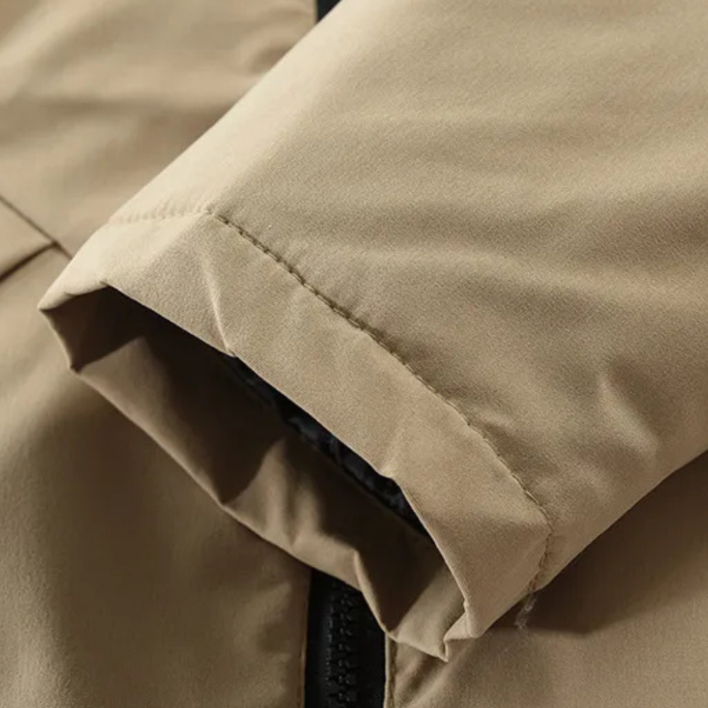 Grå vinterjacka herr, mysig och modern parkas. Varmt ytterplagg för stilmedvetna män.