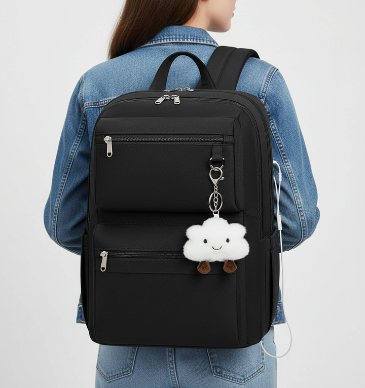 Grå ComfortPack ryggsäck med USB-laddning & vattentålig design, perfekt som arbets- eller skolväska.