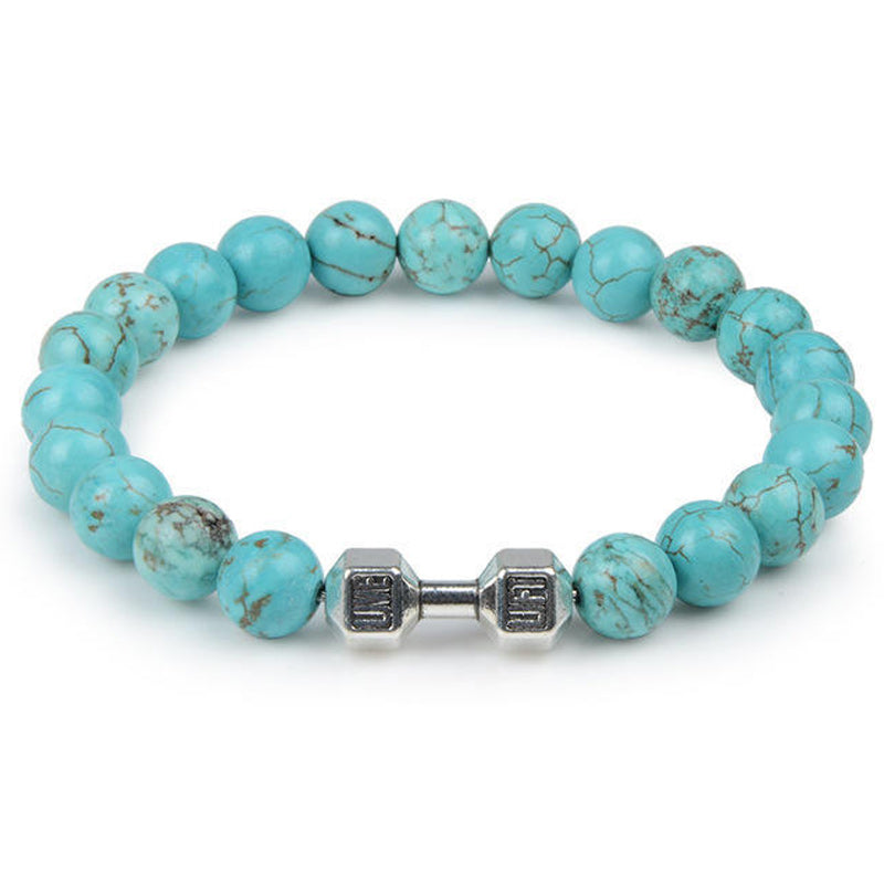 "Svart unisex hantelarmband i onyx och lavasten för chakra, elegant design, naturliga stenar, accessoar för energi och stil."