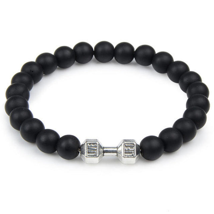 "Svart unisex hantelarmband i onyx och lavasten för chakra, elegant design, naturliga stenar, accessoar för energi och stil."