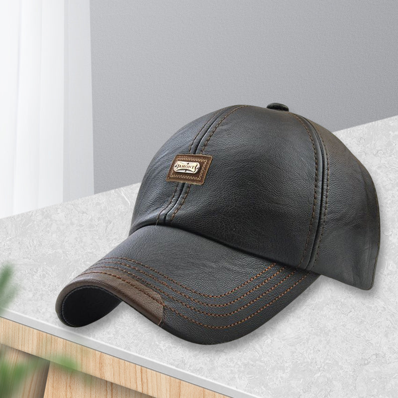 "Svart unisex PU läderkeps, justerbar med värmeisolering, klassisk design för både män och kvinnor, perfekt för kallt väder."