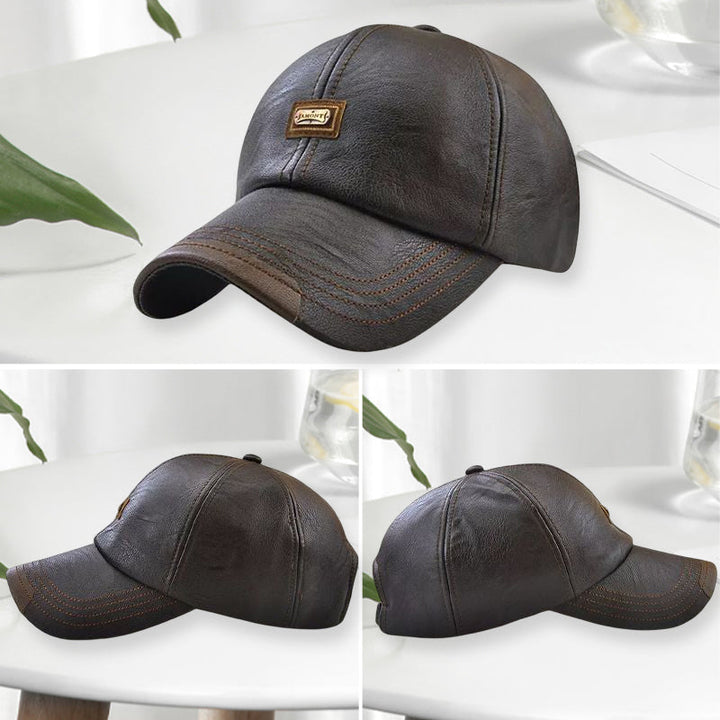 "Svart unisex PU läderkeps, justerbar med värmeisolering, klassisk design för både män och kvinnor, perfekt för kallt väder."