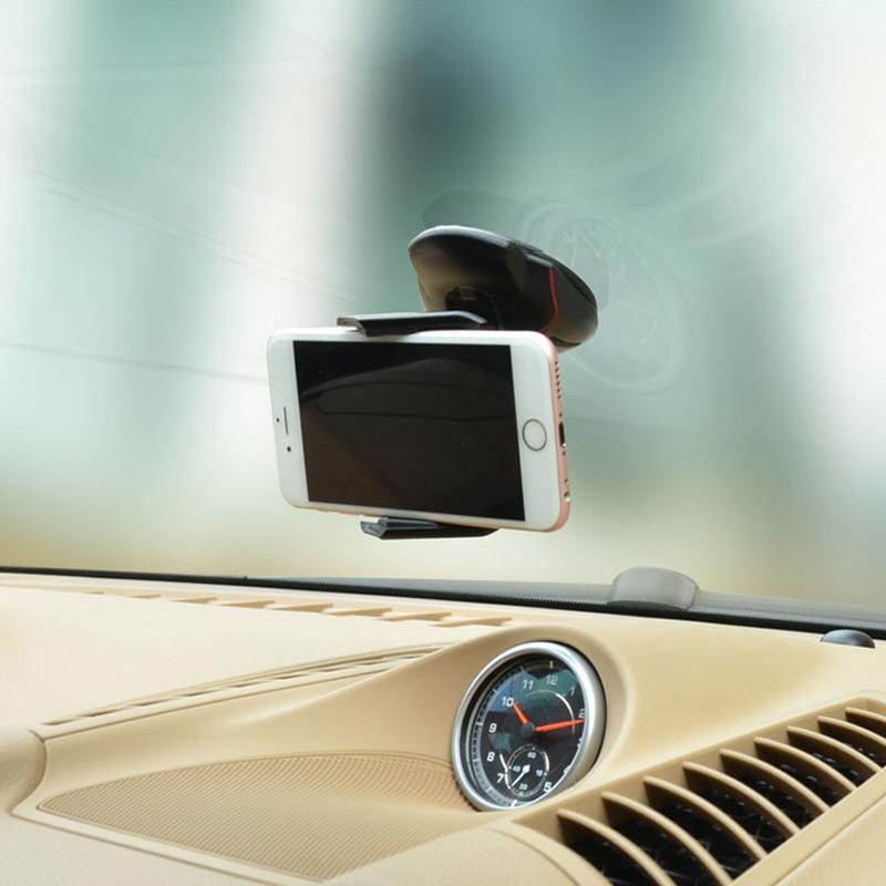 "Svart universal mobilhållare i bilen med 360° rotation, justerbar arm, fäst på instrumentbräda, håller smartphone säkert."