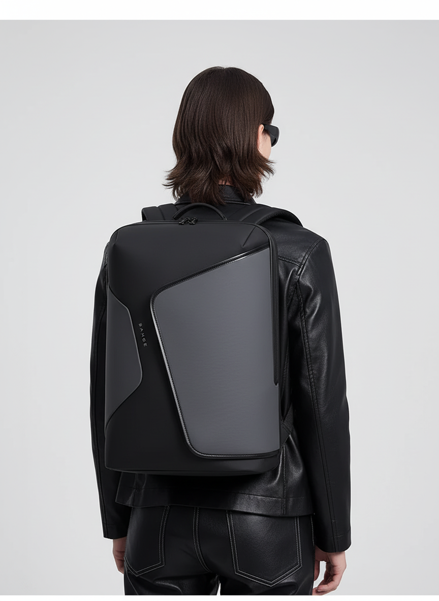Modern grå unisex pendlarryggsäck med vadderat laptopfack & integrerad USB-port.