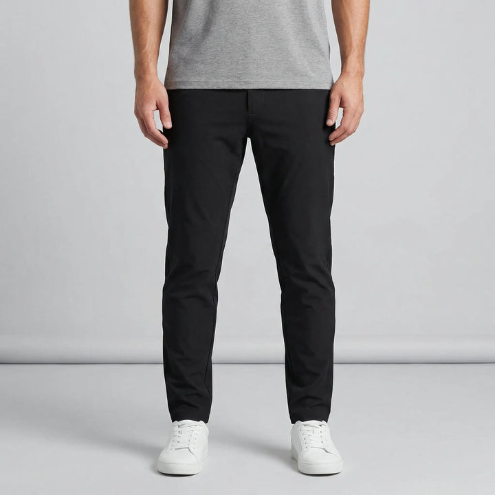 Mångsidiga eleganta herrbyxor med slim fit och raka ben, perfekta för fest eller kontor.