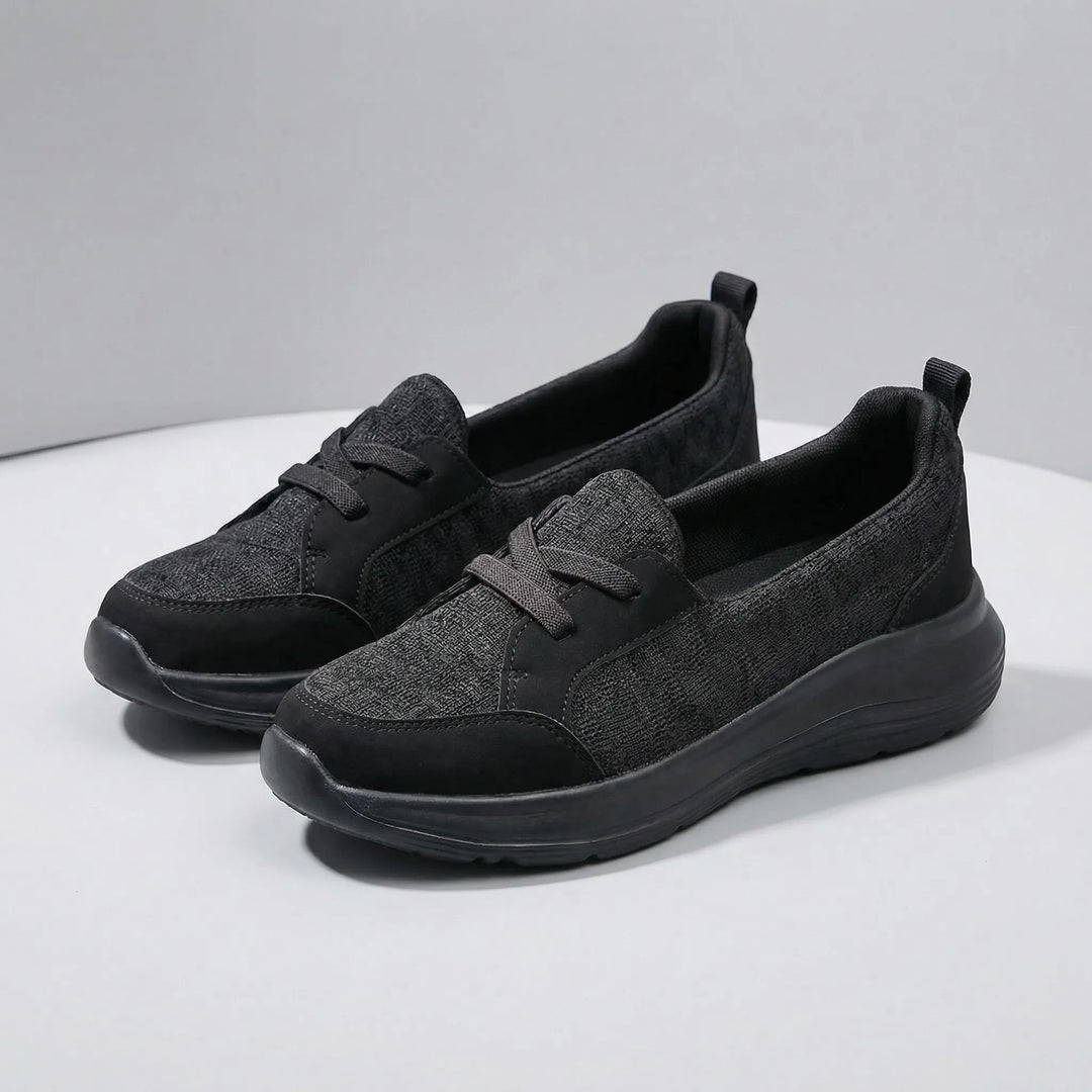 Detaljbild av bekväma slip-on damsneakers Phoebe, visar flexibelt material och sula.