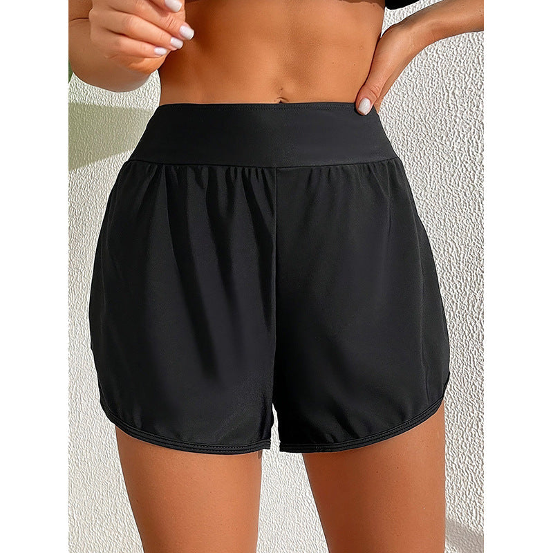 Svarta sportshorts dam, hög midja & lös passform för optimal komfort vid träning & fritid.