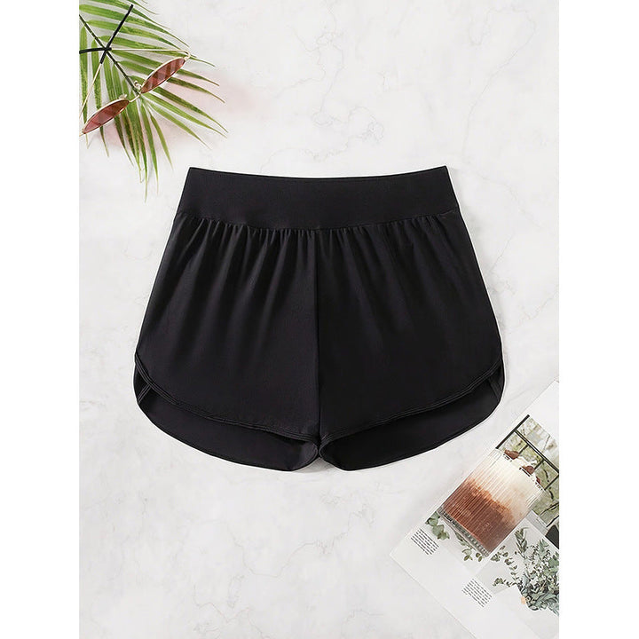 Kvinnors sportshorts med hög midja, lösa och luftiga för maximal rörelsefrihet. Svarta, perfekta för träning.