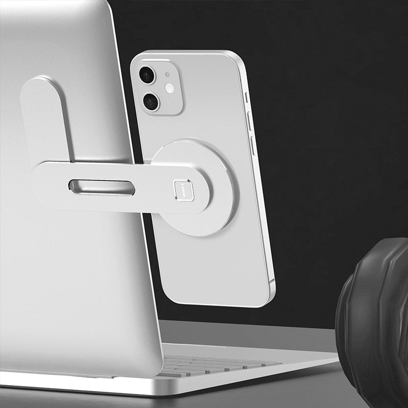 Magnetisk telefonhållare i aluminium, svart/silver, monterad på datorskärm.