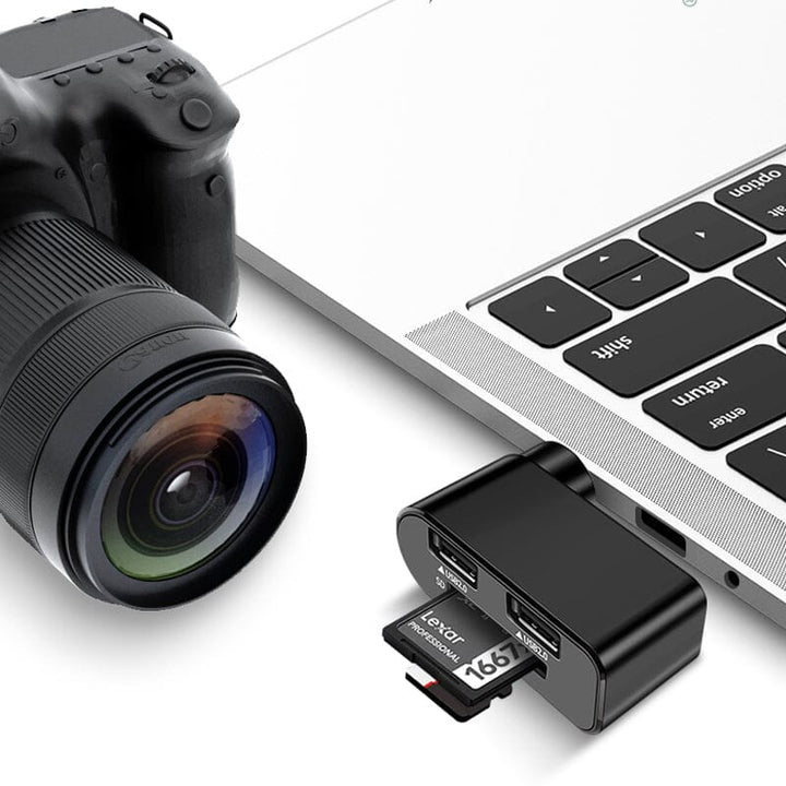 Svart och vit roterbar 4-portars USB-hubb för datorer och surfplattor, ger enkel anslutning och 180 graders rotation.