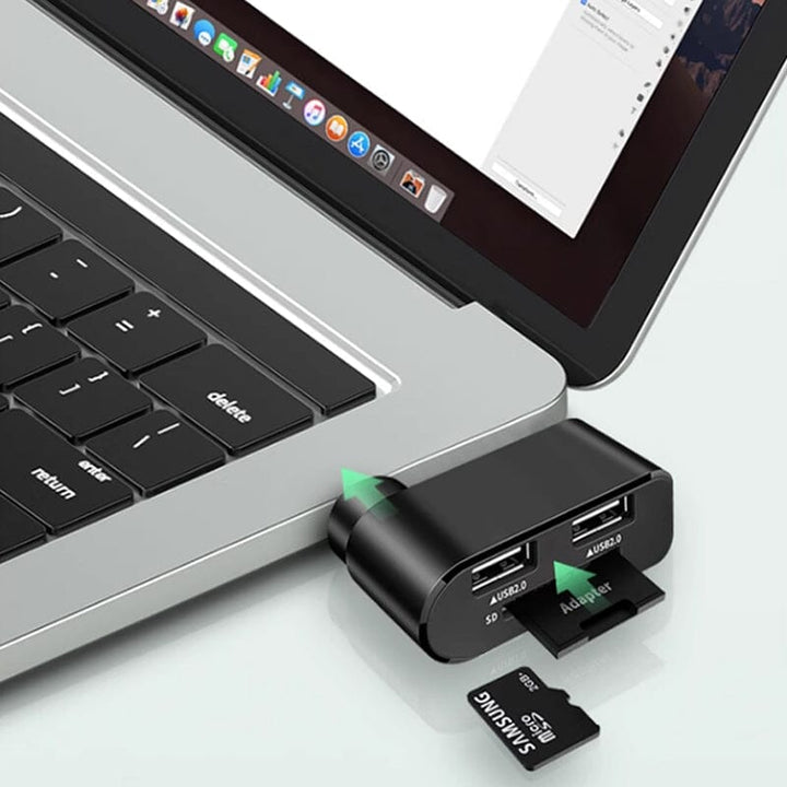 Svart och vit roterbar 4-portars USB-hubb för datorer och surfplattor, ger enkel anslutning och 180 graders rotation.