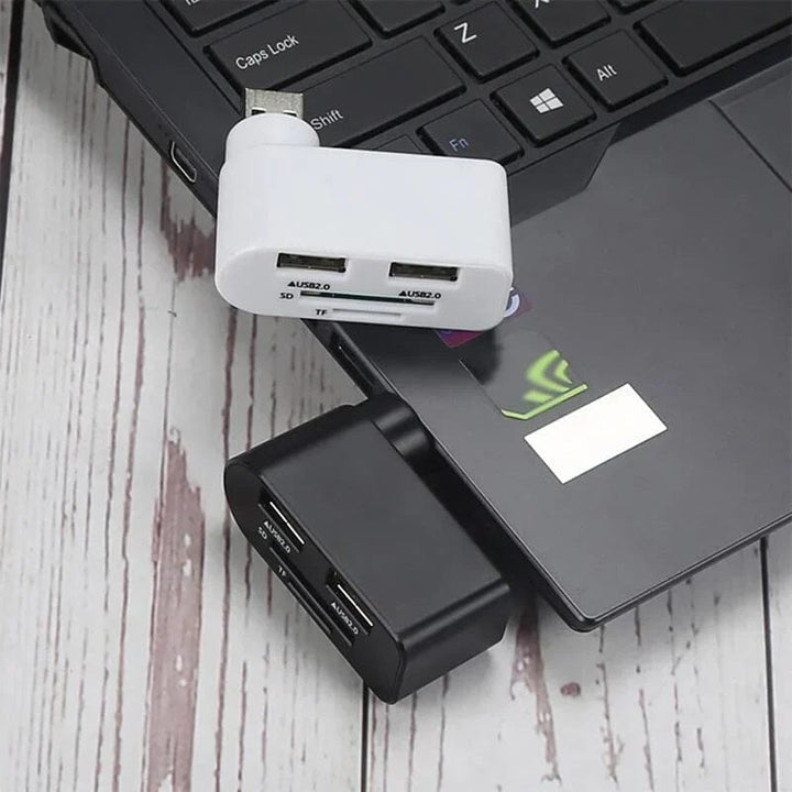 Svart och vit roterbar 4-portars USB-hubb för datorer och surfplattor, ger enkel anslutning och 180 graders rotation.