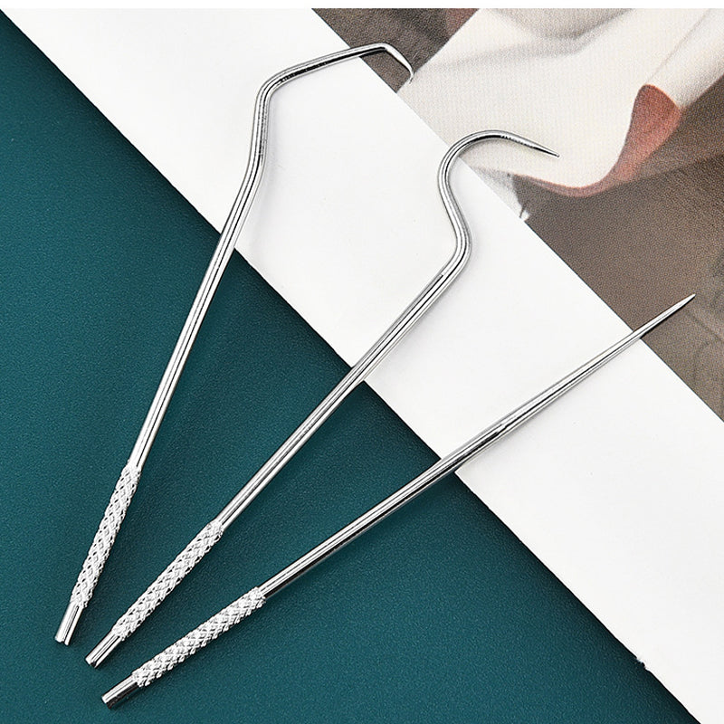 "Tandpetare i rostfritt stål för daglig hygien, stilren och hållbar design, idealisk för personlig hälsovård."