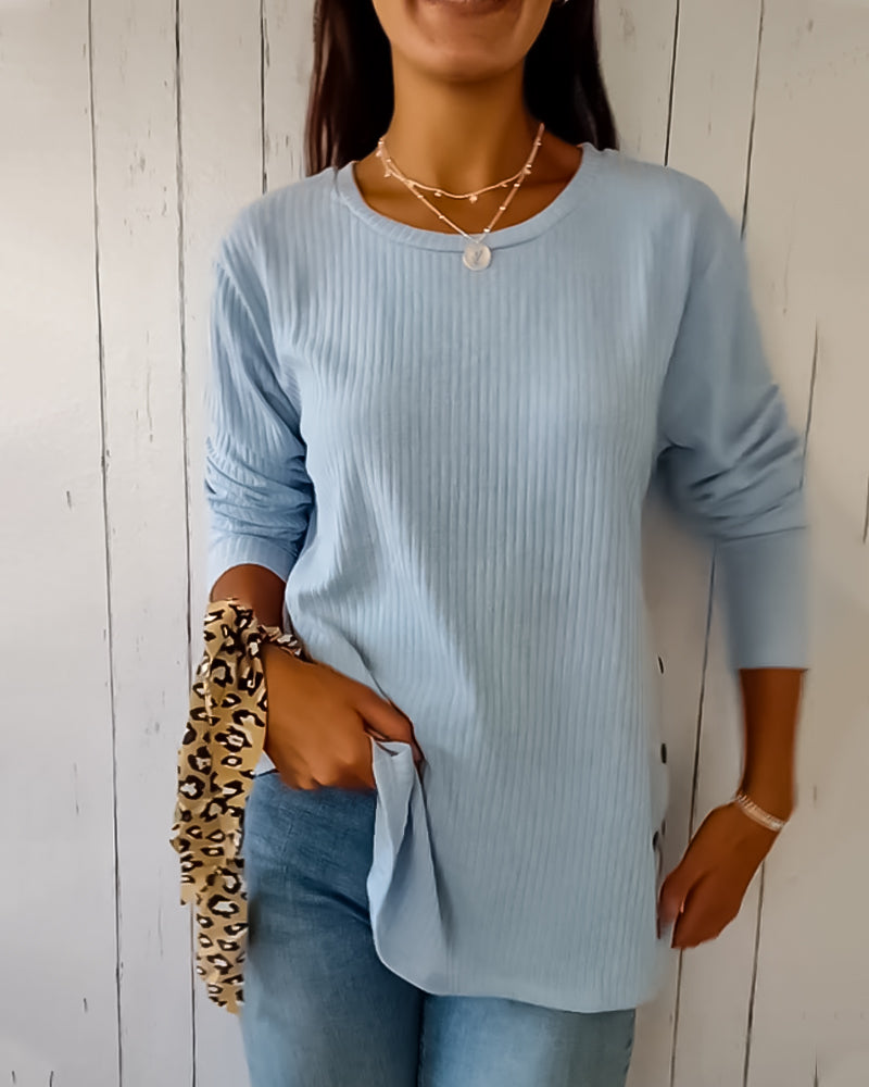 Långärmad tröja för dam i ledig modell med rund hals
